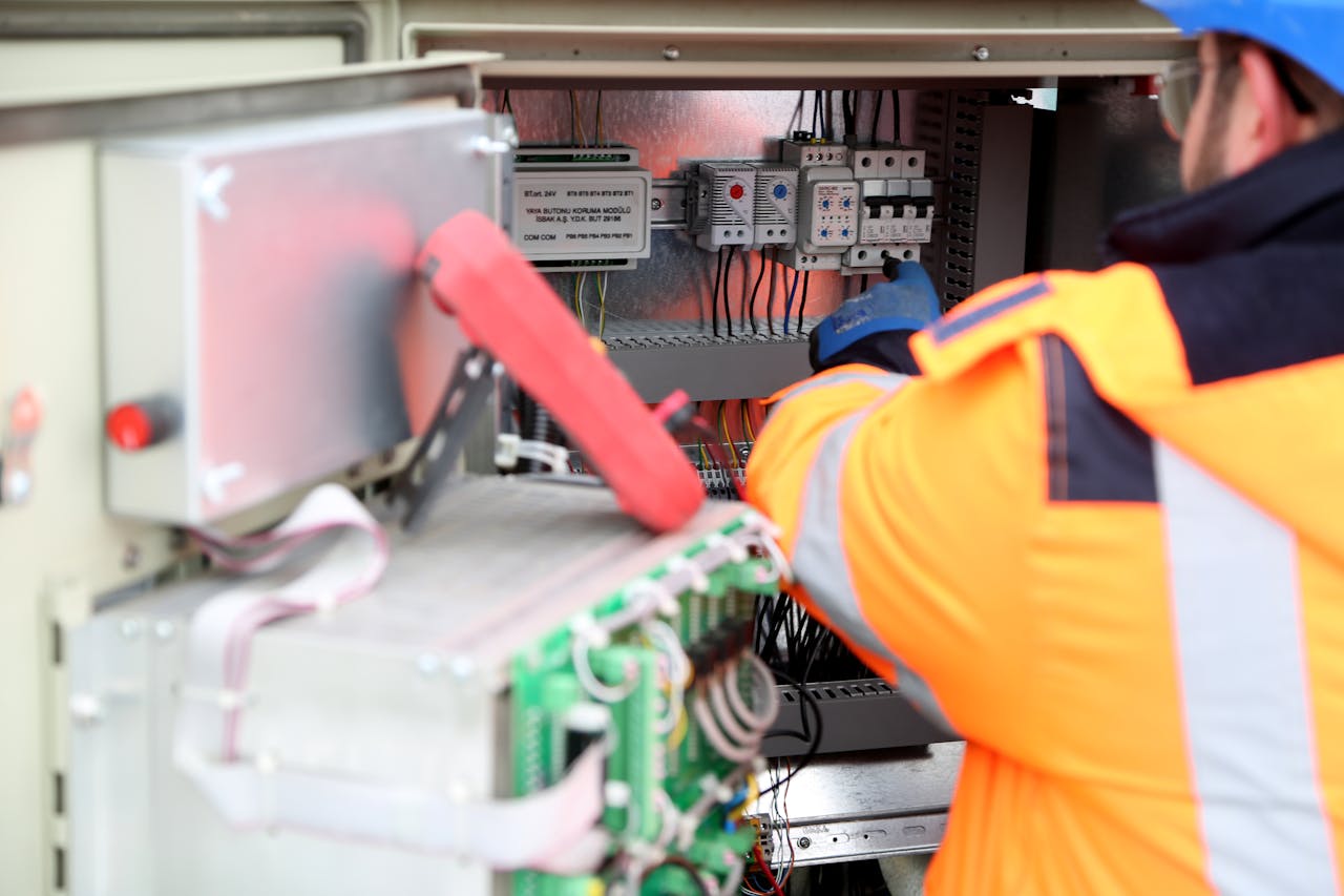 Technician maintaining a power inverter